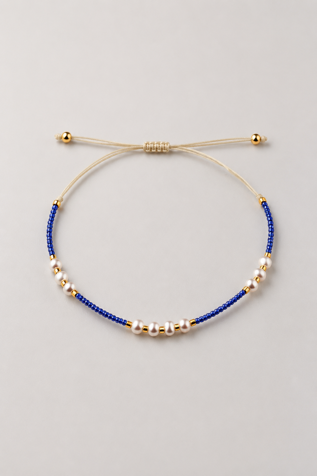 Blue and Pearl Beaded Cord Bracelet