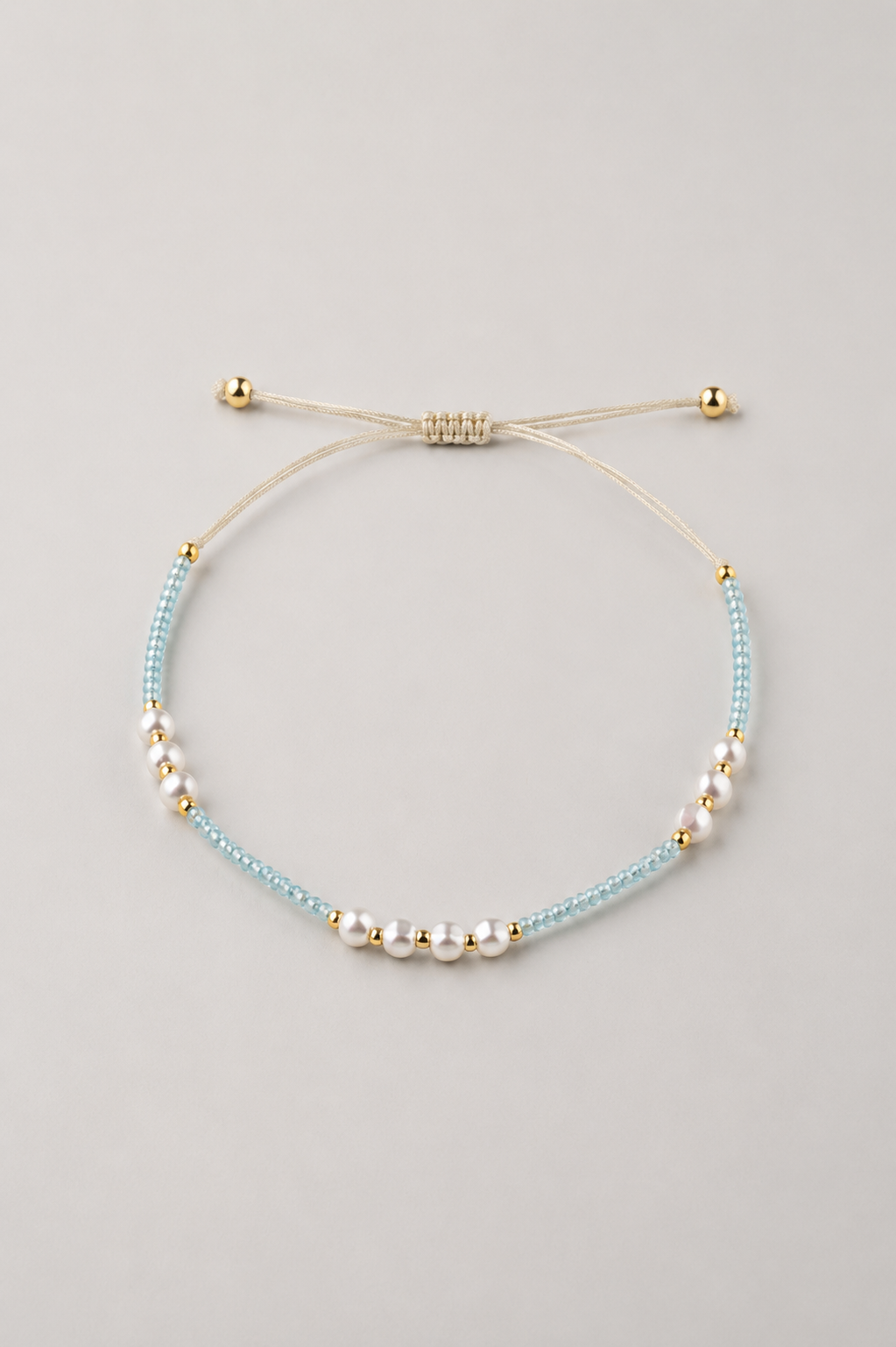 Blue and Pearl Beaded Cord Bracelet